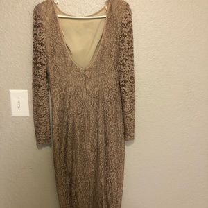 Midy dressy tan dress close fitting.